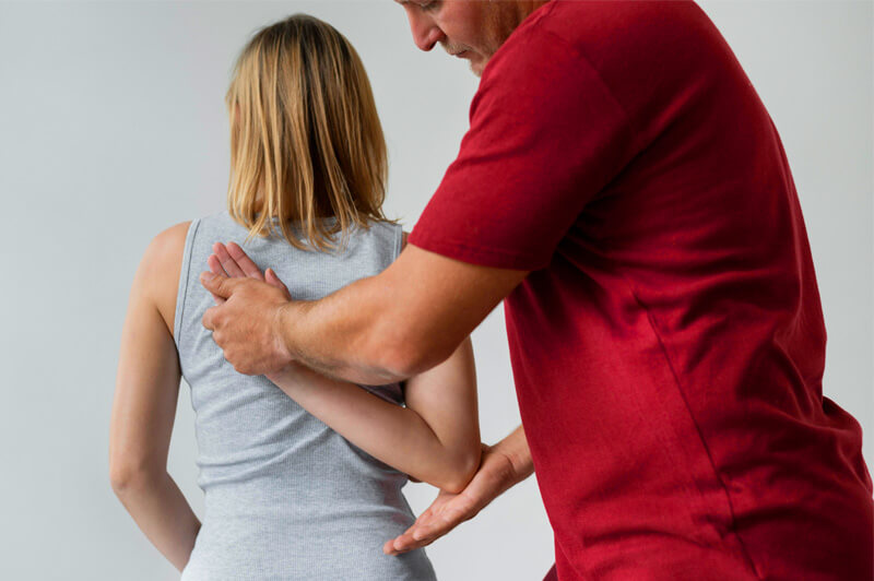Physiotherapist assisting a patient at Omega Physiotherapy clinic