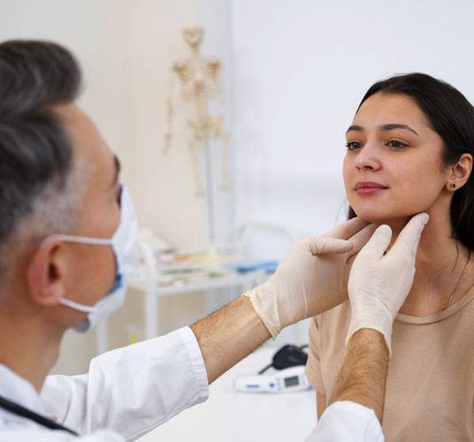 Patient receiving TMJ rehabilitation therapy at Omega Physiotherapy